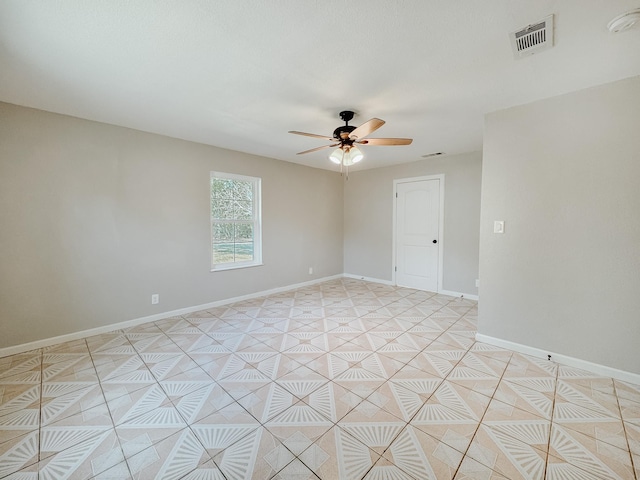 unfurnished room with ceiling fan