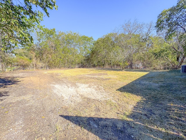 view of yard featuring central AC unit