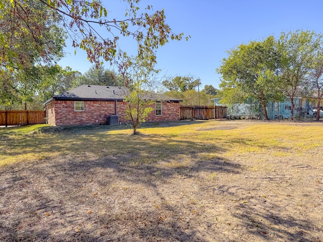 view of yard with central AC