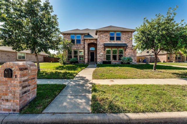 view of front of house with a front lawn