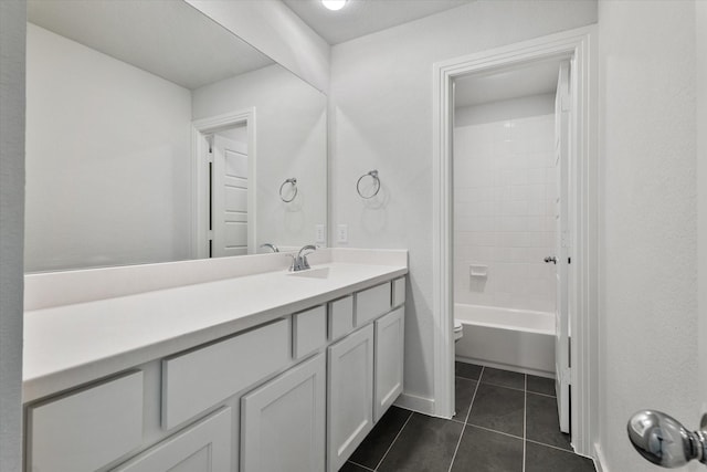 bathroom with toilet, tile patterned flooring, shower / washtub combination, and vanity