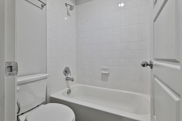 bathroom with shower / bathtub combination and toilet