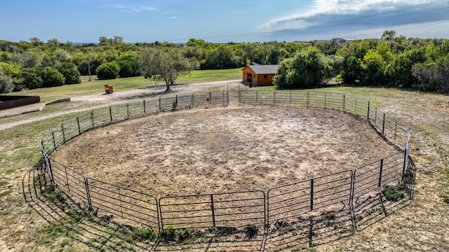 view of yard with a rural view