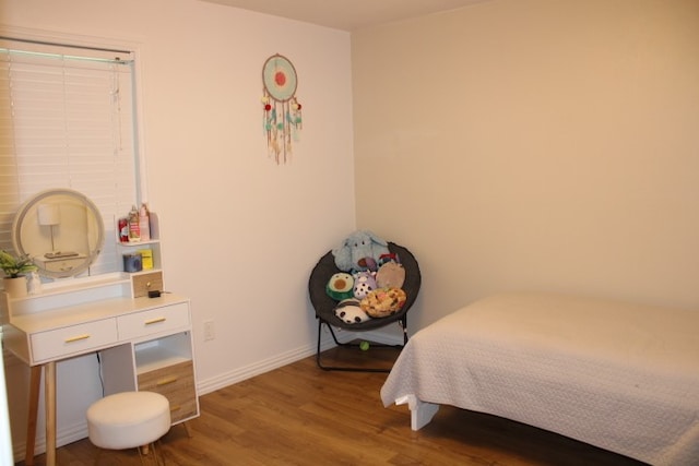 bedroom featuring hardwood / wood-style floors