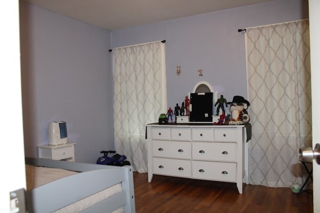 bedroom featuring dark hardwood / wood-style floors