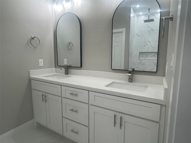 bathroom with vanity and walk in shower