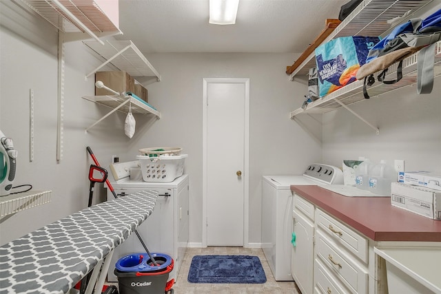 clothes washing area featuring washing machine and dryer