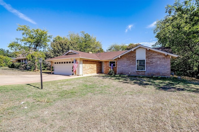 single story home featuring a front yard and a garage