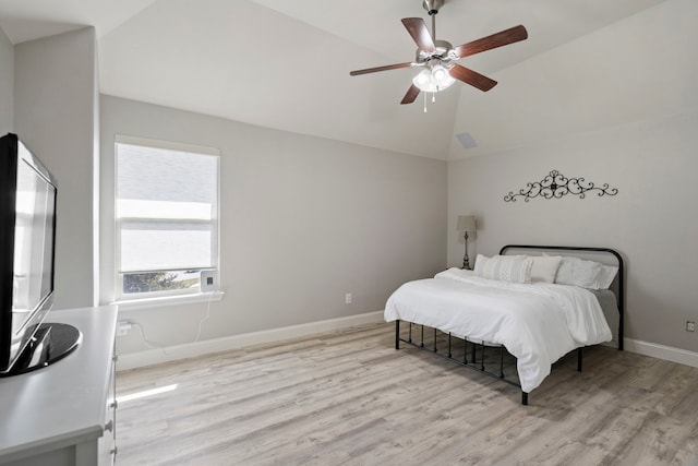 bedroom with high vaulted ceiling, light wood-type flooring, and ceiling fan