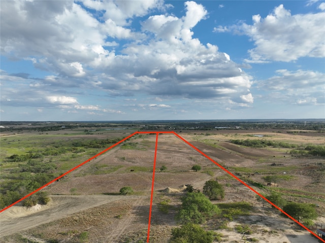 birds eye view of property featuring a rural view