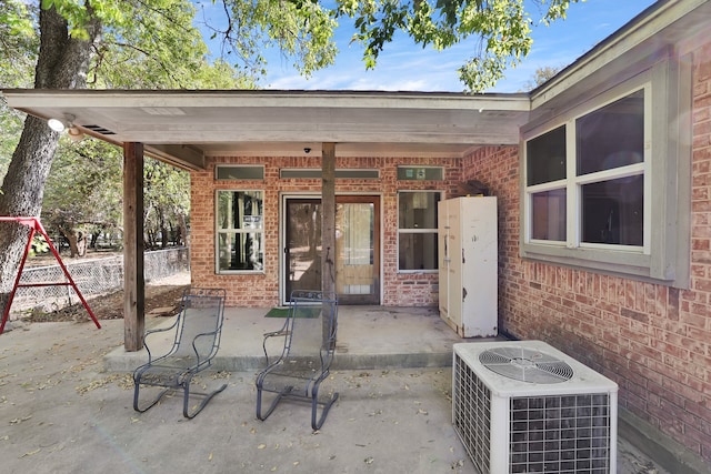 view of patio with central AC