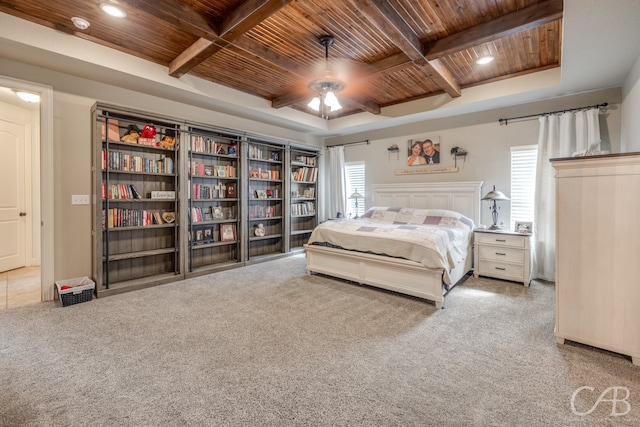 bedroom with multiple windows, light colored carpet, and wooden ceiling