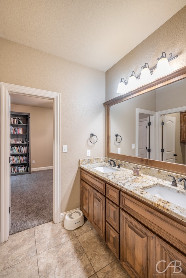 bathroom featuring vanity and tile patterned flooring