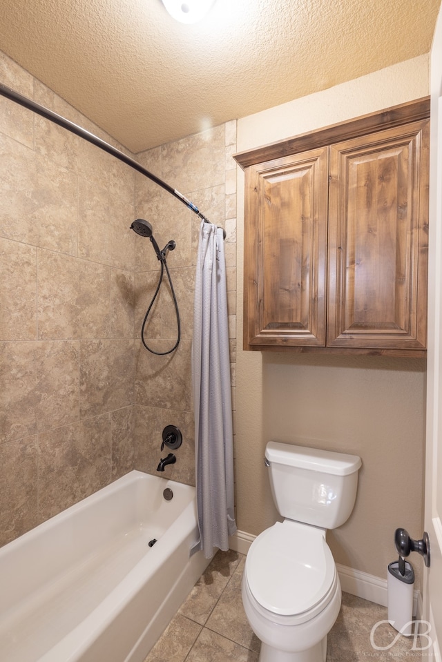 bathroom with toilet, a textured ceiling, tile patterned floors, and shower / tub combo