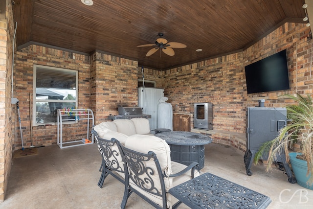 view of patio / terrace featuring ceiling fan