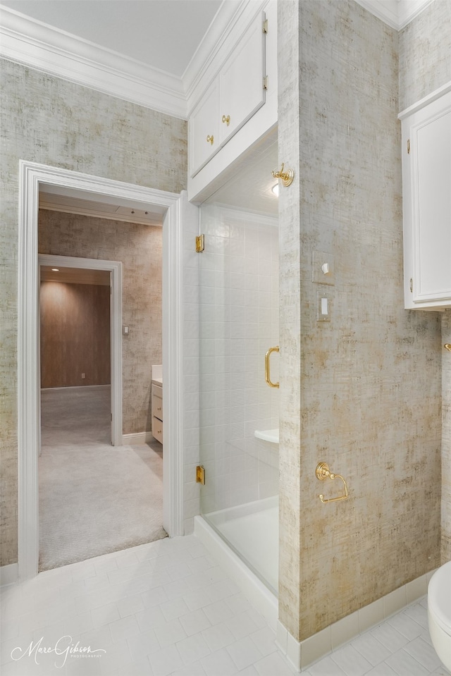 full bathroom featuring ornamental molding, a shower stall, baseboards, and wallpapered walls