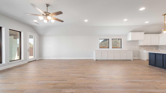 unfurnished living room featuring ceiling fan, recessed lighting, visible vents, baseboards, and light wood finished floors