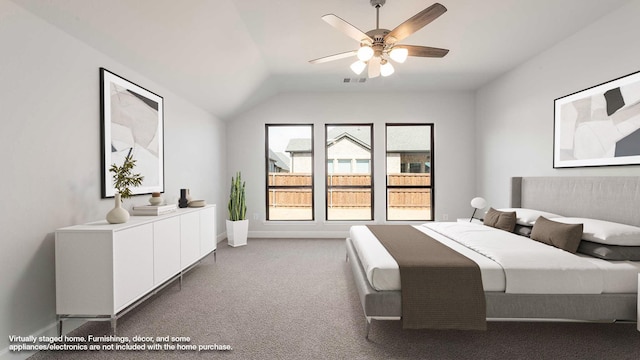 carpeted bedroom featuring vaulted ceiling, a ceiling fan, visible vents, and baseboards