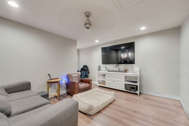 living room with light hardwood / wood-style floors