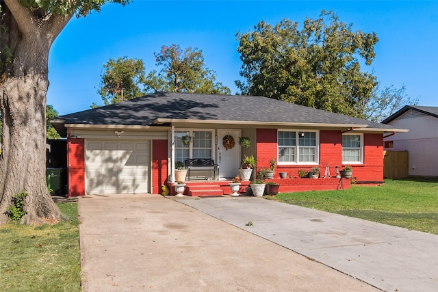 ranch-style house with a front yard and a garage