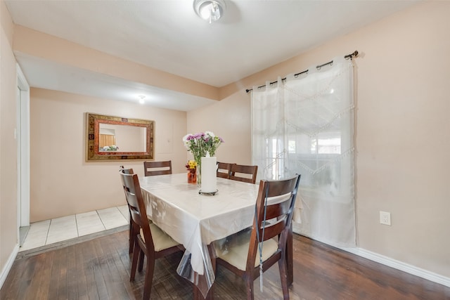 dining room with hardwood / wood-style floors