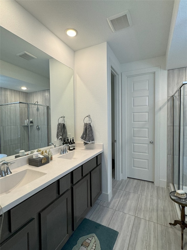 bathroom featuring vanity and walk in shower