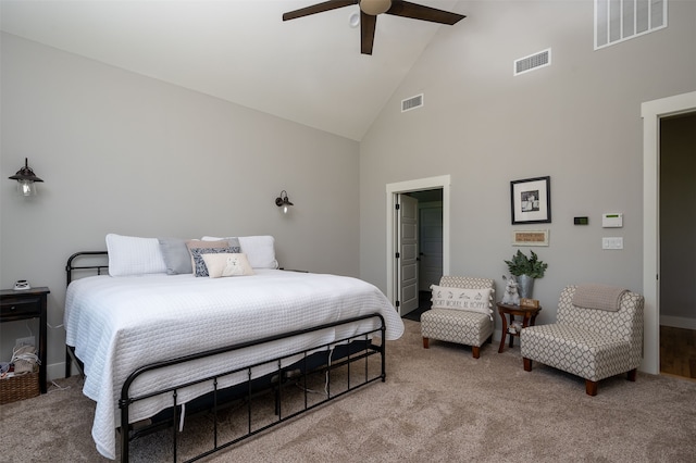 carpeted bedroom featuring high vaulted ceiling and ceiling fan