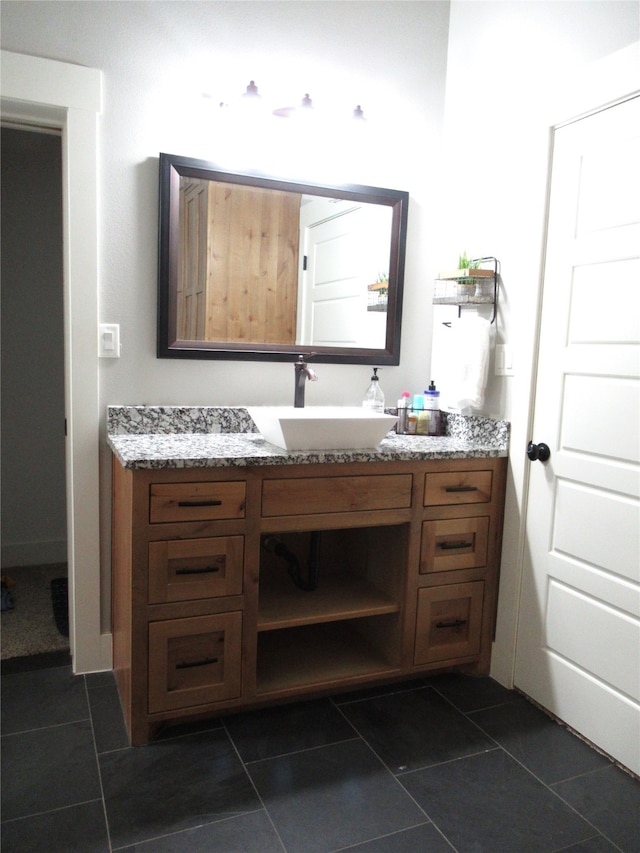 bathroom featuring vanity and tile patterned flooring