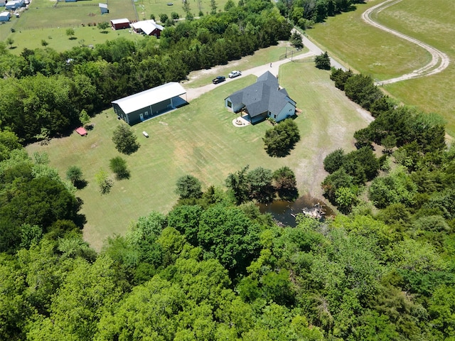 birds eye view of property featuring a rural view