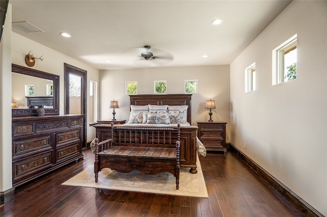 bedroom featuring dark wood-type flooring and ceiling fan