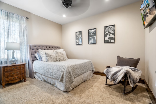 carpeted bedroom with ceiling fan