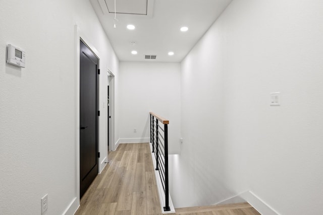 hallway featuring light hardwood / wood-style floors