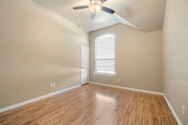 unfurnished room with vaulted ceiling, light hardwood / wood-style flooring, and ceiling fan