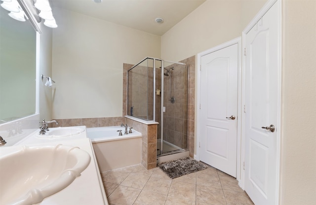 bathroom featuring vanity, separate shower and tub, and tile patterned flooring