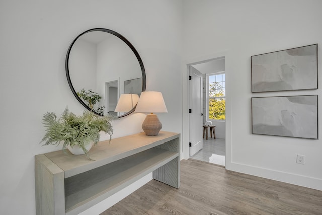 corridor featuring light hardwood / wood-style flooring