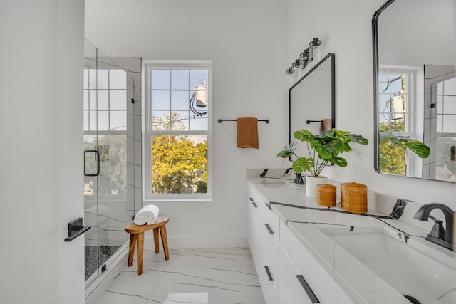 bathroom with vanity and walk in shower