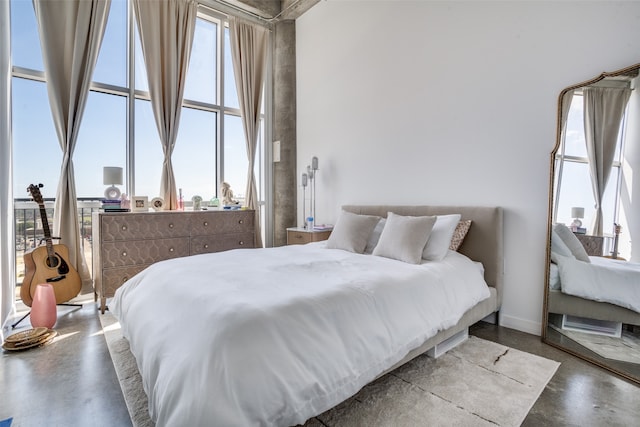 bedroom with concrete floors