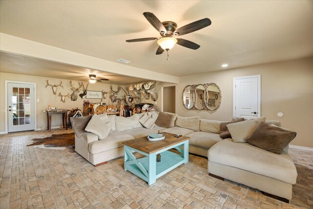 2720 N US-377, Stephenville, TX 76401 - living area featuring baseboards, ceiling fan, and recessed lighting