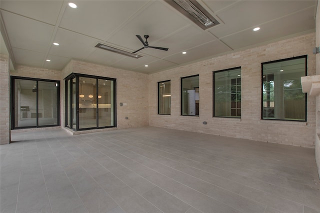 view of patio featuring ceiling fan