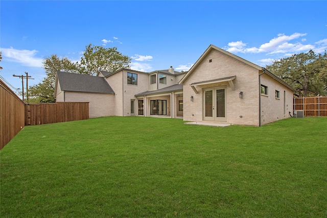 4208 Allencrest, Dallas, TX 75244 - back of house with central air condition unit, brick siding, a fenced backyard, french doors, and a yard