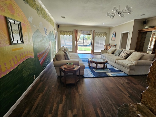 living room with dark wood-type flooring, crown molding, and a notable chandelier