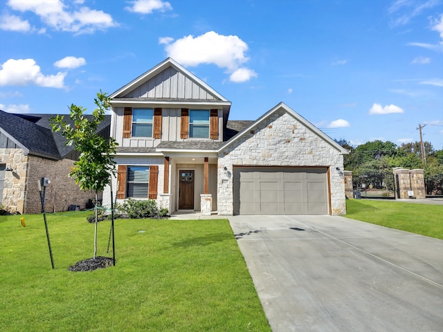 craftsman-style house featuring a garage and a front lawn