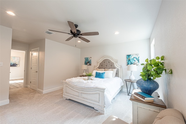 carpeted bedroom with ceiling fan