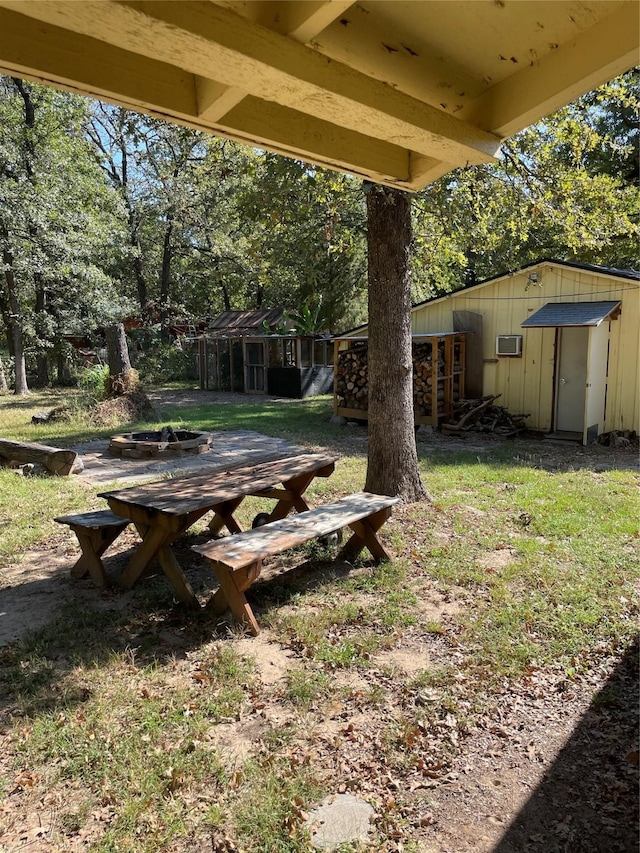 view of yard with a storage unit