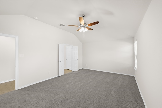 interior space featuring vaulted ceiling and ceiling fan