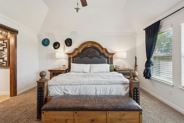 bedroom with vaulted ceiling, ceiling fan, and light colored carpet