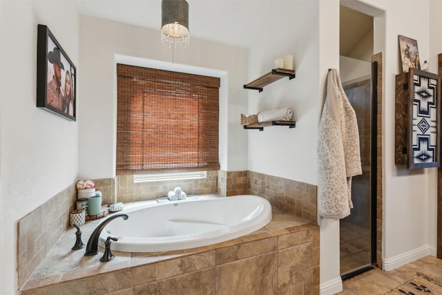 bathroom with independent shower and bath