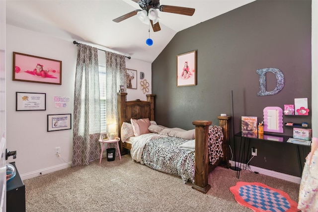 carpeted bedroom featuring ceiling fan and vaulted ceiling