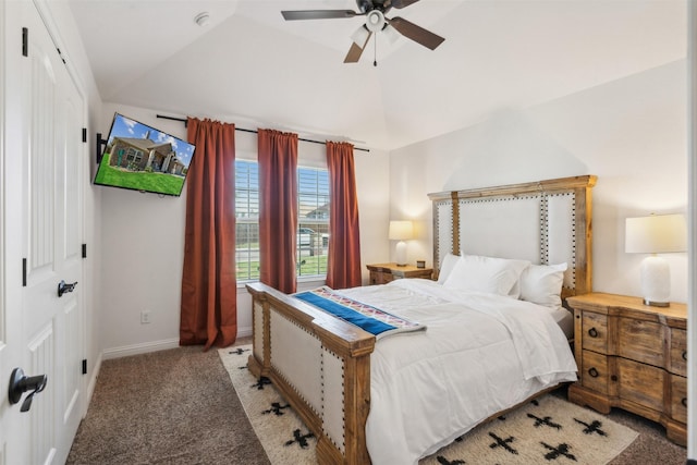 carpeted bedroom with ceiling fan, a closet, and lofted ceiling