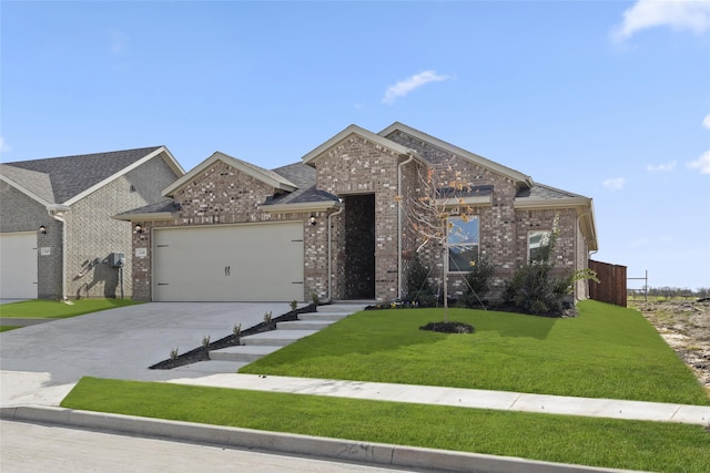 view of front of house featuring a front yard and a garage